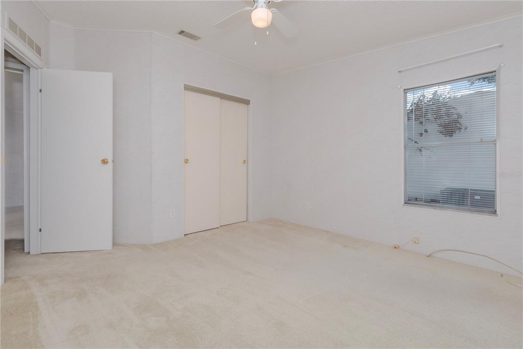 1001 Starkey Road, Unit 767 Largo, FL 33771 - Photo 10 of 41 a view of an empty room with a window