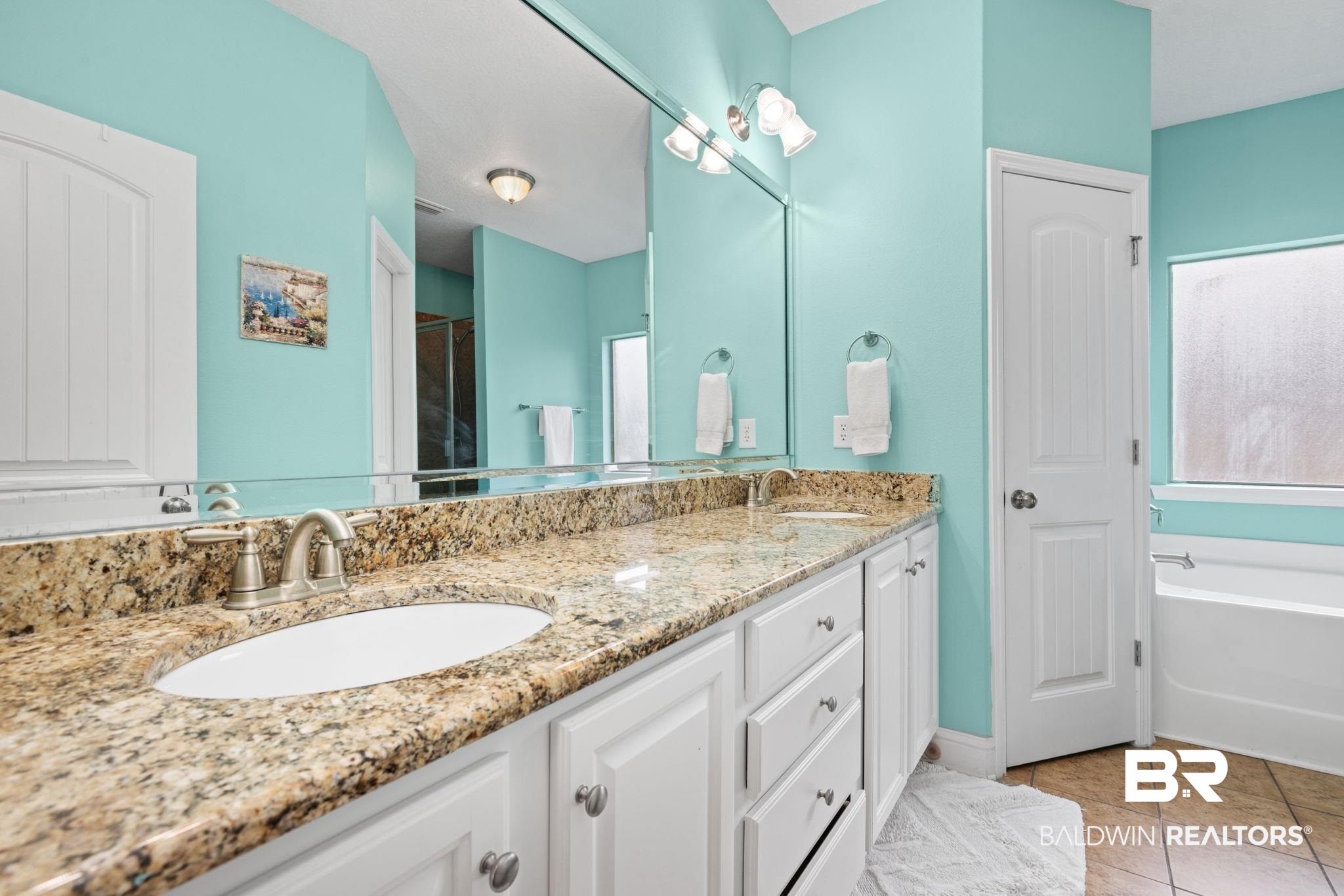 2554 Masters Court Mobile, AL 36618 - Photo 18 of 35 Full bathroom featuring double vanity, a garden tub, tile patterned flooring, and a shower