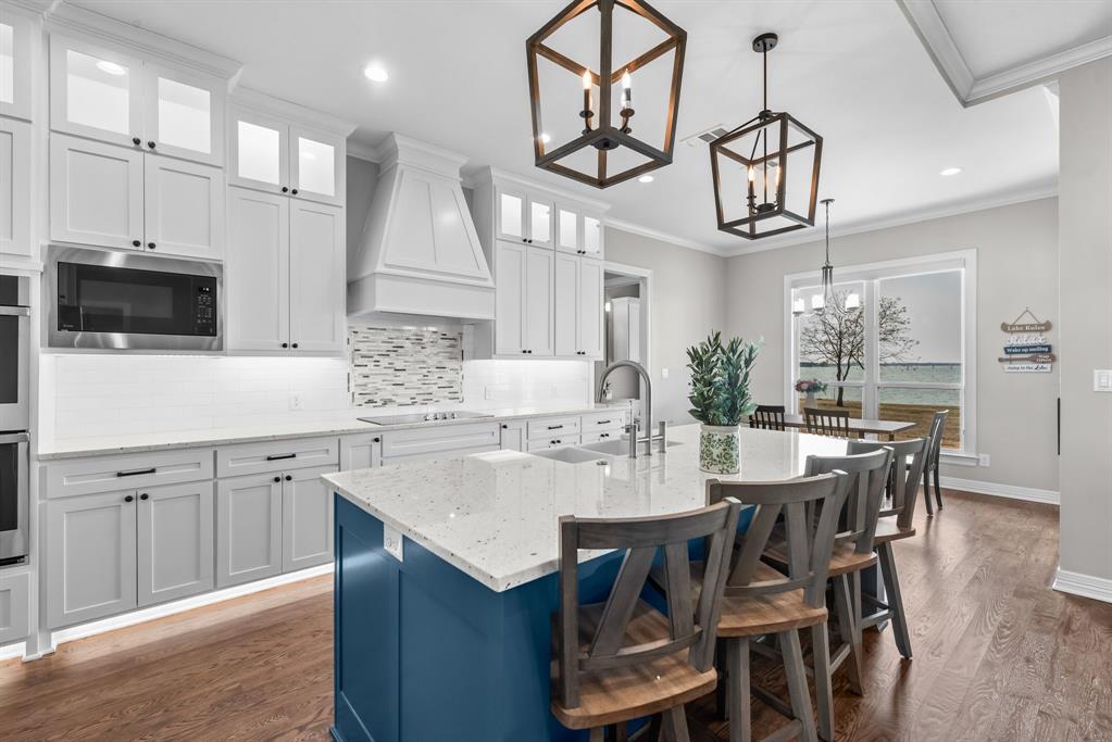 3016 Lake Ridge Drive Streetman, TX 75859 - Photo 12 of 40 Appliances include a double oven, built in microwave and refrigerator.