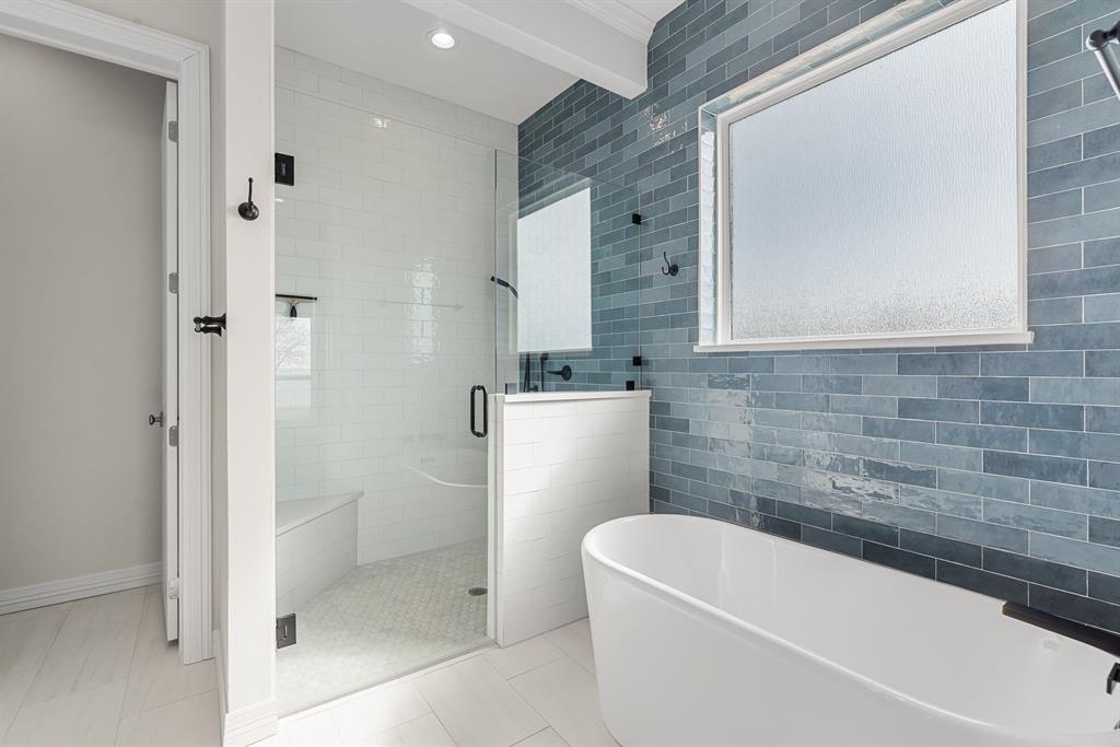 3016 Lake Ridge Drive Streetman, TX 75859 - Photo 17 of 40 The spacious walk in shower ...or the stand alone soaking tub....your choice of way to relax after a long day of fun out on the lake!