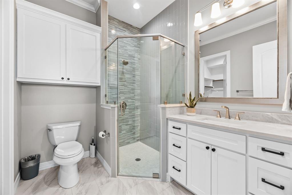 3016 Lake Ridge Drive Streetman, TX 75859 - Photo 20 of 40 Second Primary Bathroom...the roomy walk in glass shower in the full ensuite bathroom ensures that nobody is waiting for a cleanup!