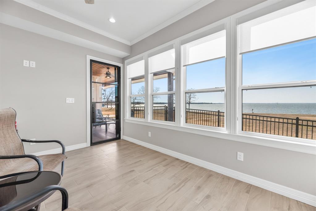 3016 Lake Ridge Drive Streetman, TX 75859 - Photo 24 of 40 It provides wall to wall lake views and is accessed from the patio. Think art studio, home office or even another bedroom!