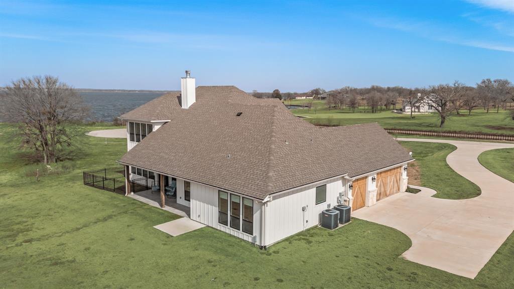 3016 Lake Ridge Drive Streetman, TX 75859 - Photo 37 of 40 You'll have plenty of parking areas, and the 3 car garage can stash away cars, lake toys and lawn equipment safely!