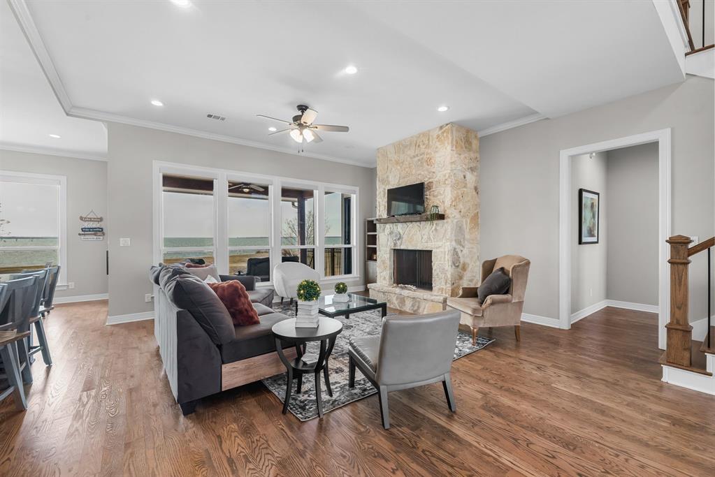 3016 Lake Ridge Drive Streetman, TX 75859 - Photo 39 of 40 The open floor plan allows you to enter straight into the living area where the lake is on full display!