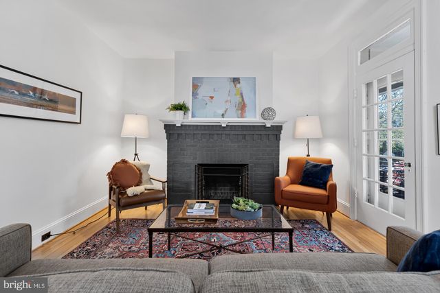a view of a balcony with chairs