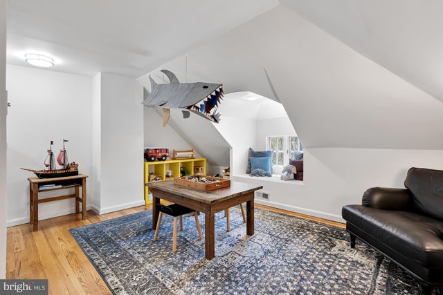 a view of a bedroom with closet and cabinet