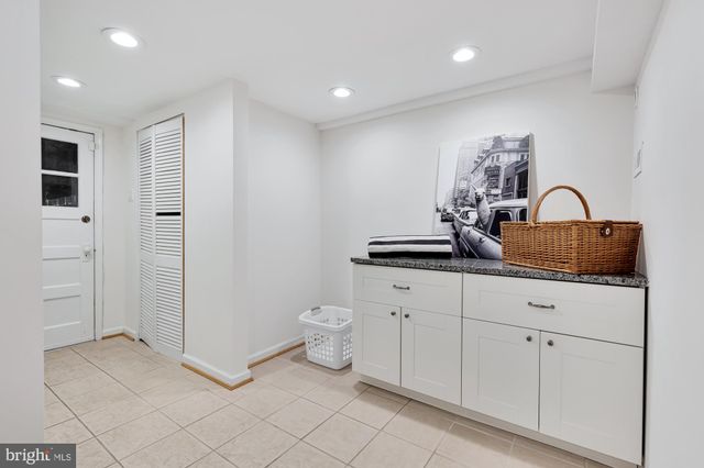 a view of a house with a yard porch and sitting area