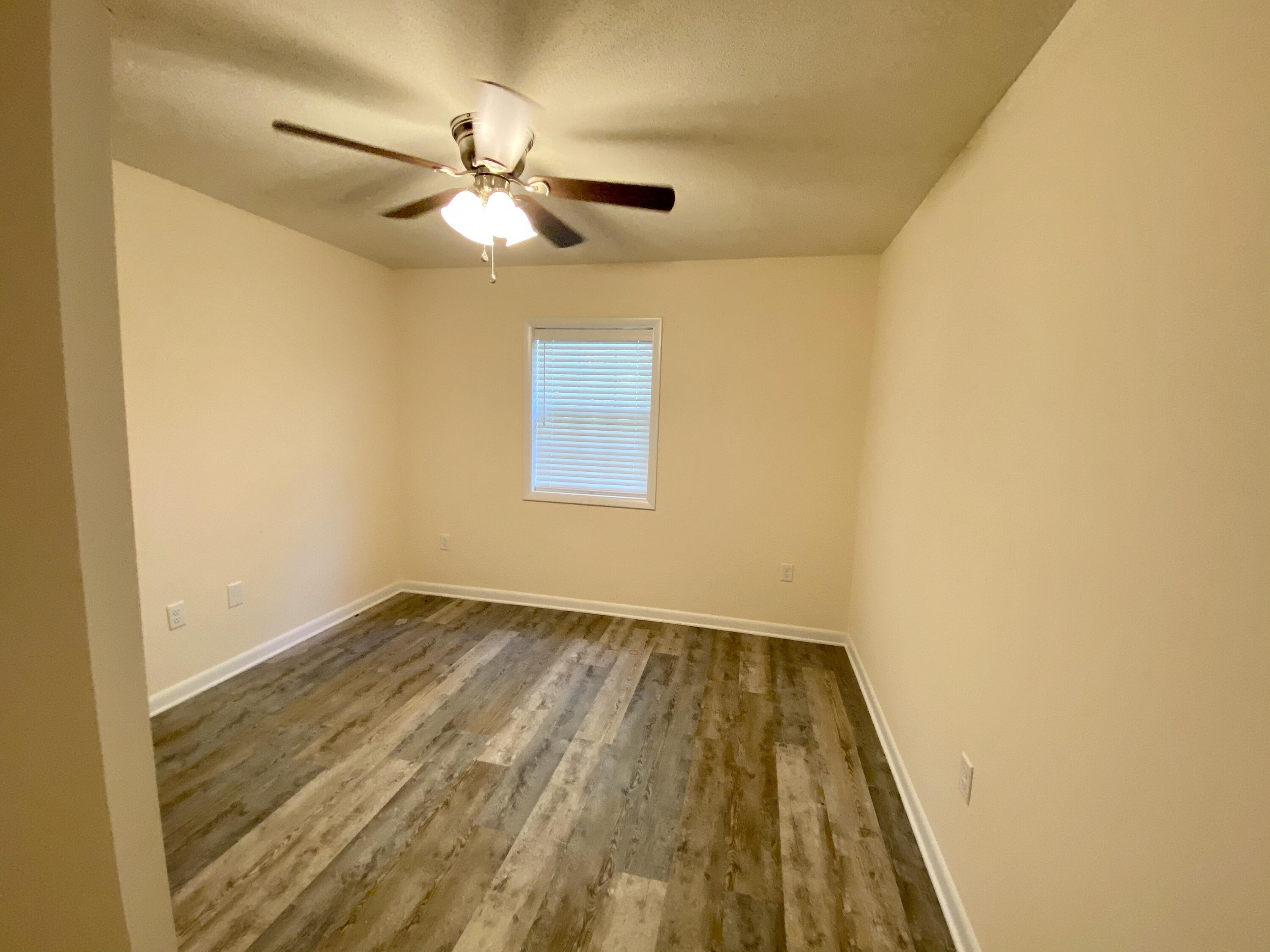 41 Bramble Street Santa Rosa Beach, FL 32459 - Photo 14 of 15 a view of wooden floor in a room