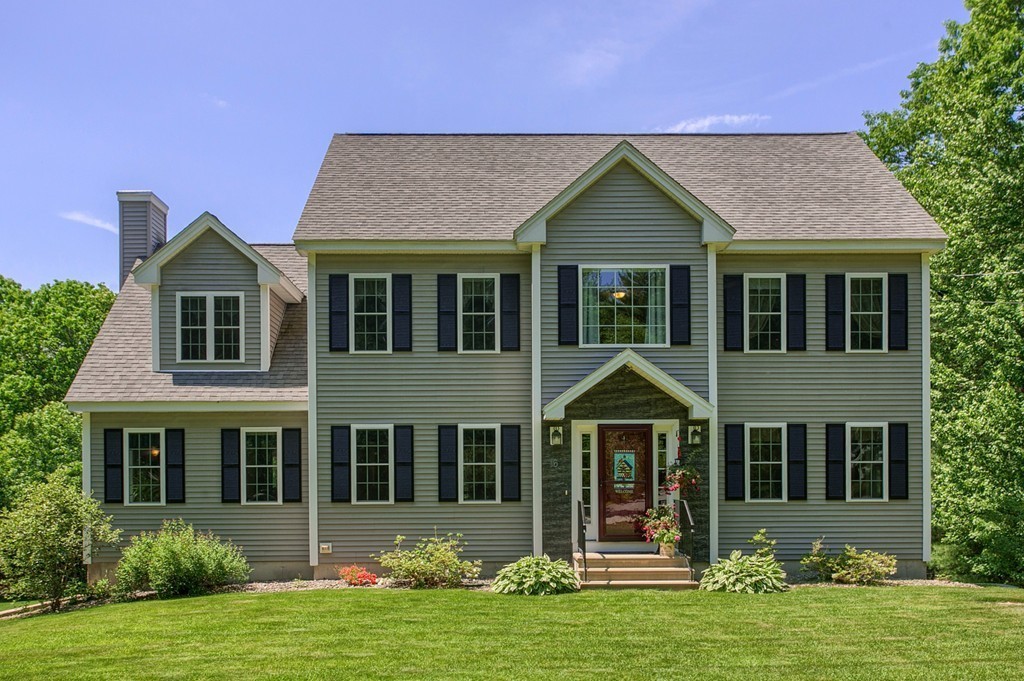 16 Adams Road Townsend, MA 01469 - Photo 1 of 30 a front view of a house with a yard