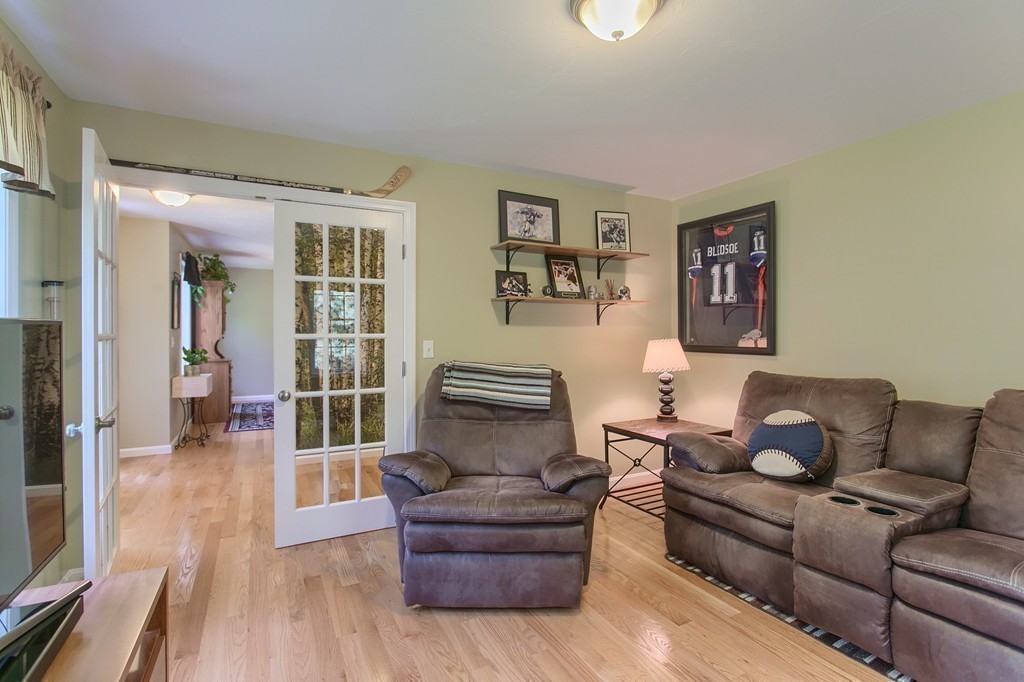 16 Adams Road Townsend, MA 01469 - Photo 13 of 30 a living room with furniture and a couch