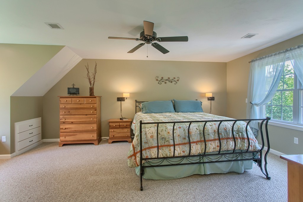 16 Adams Road Townsend, MA 01469 - Photo 14 of 30 a bedroom with a bed and a dresser
