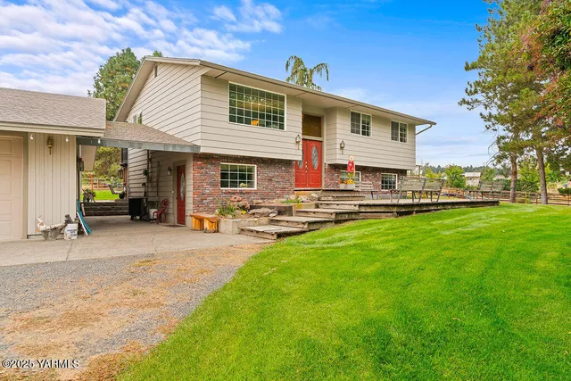 a front view of building with yard