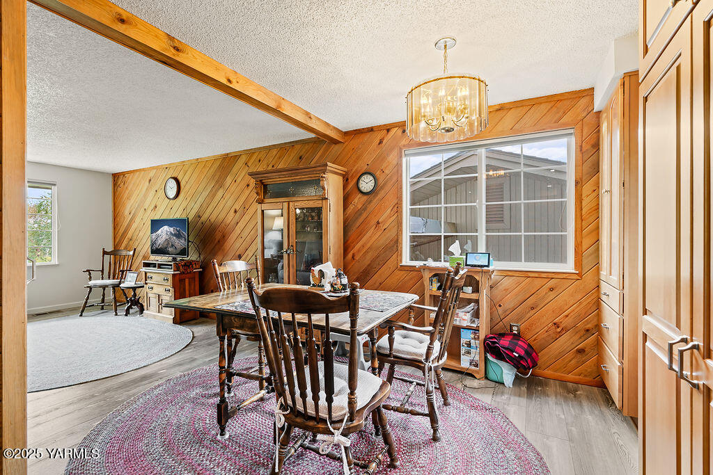 250 Hexon Road Selah, WA 98942 - Photo 21 of 50 a dining room with furniture and wooden floor