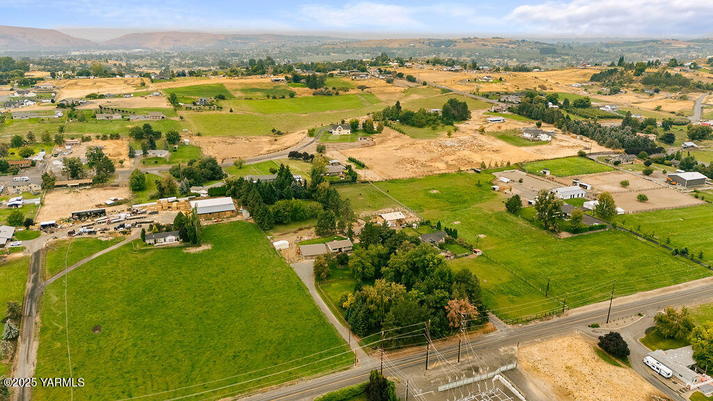 250 Hexon Road Selah, WA 98942 - Photo 3 of 50 an aerial view of residential houses with outdoor space