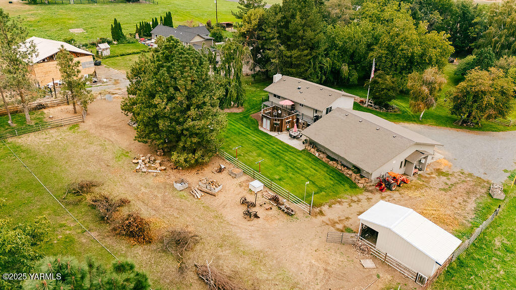 250 Hexon Road Selah, WA 98942 - Photo 10 of 50 an aerial view of a house with a yard and lake view
