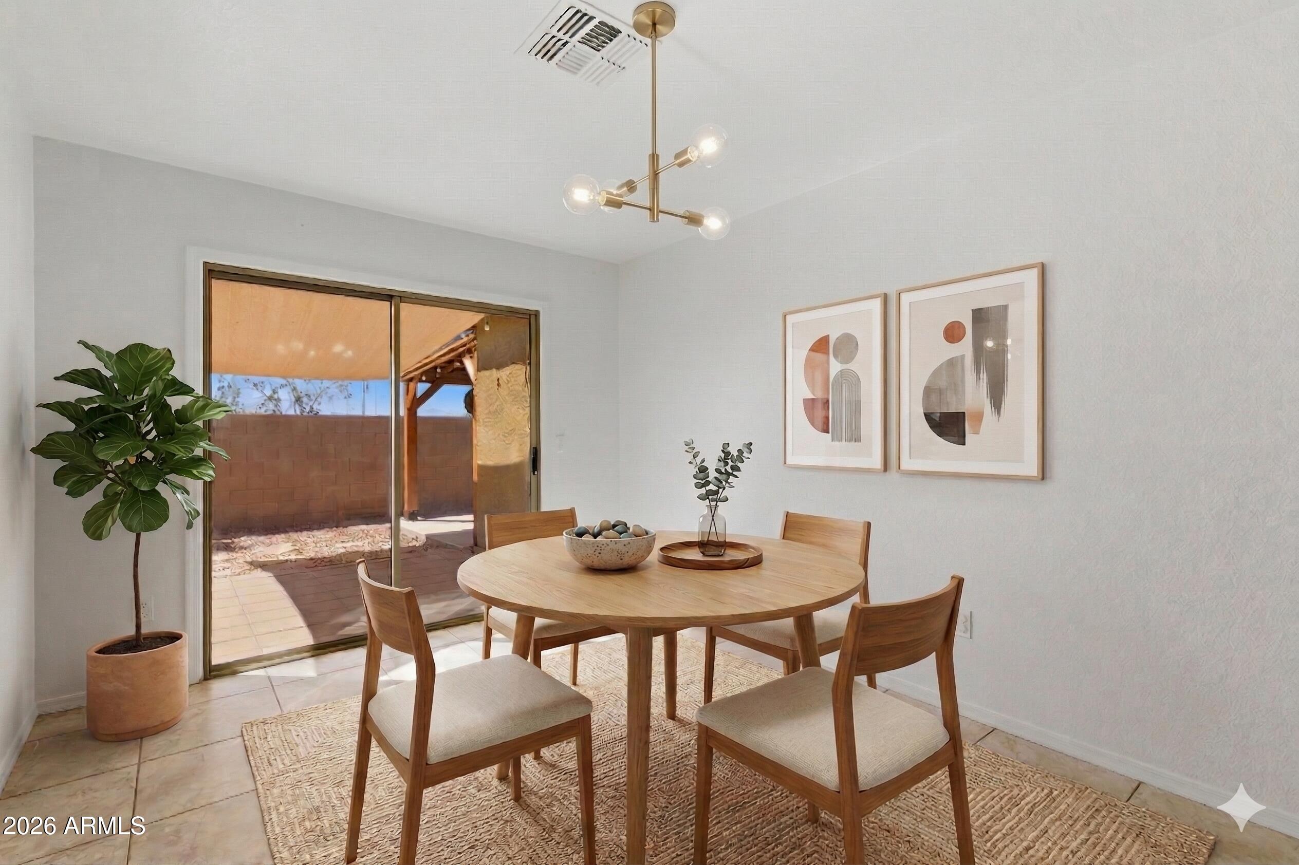 9407 West Eaton Road Phoenix, AZ 85037 - Photo 9 of 21 Virtually staged dining room