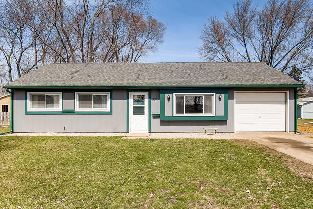 67 Saugatuck Road Montgomery, IL 60538 - Photo 1 of 17 a front view of a house with a garden