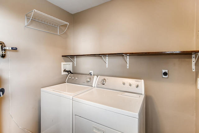 67 Saugatuck Road Montgomery, IL 60538 - Photo 12 of 17 a utility room with dryer and washer