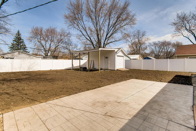 67 Saugatuck Road Montgomery, IL 60538 - Photo 16 of 17 a view of backyard with large trees