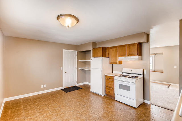 67 Saugatuck Road Montgomery, IL 60538 - Photo 3 of 17 a view of a kitchen with wooden floor