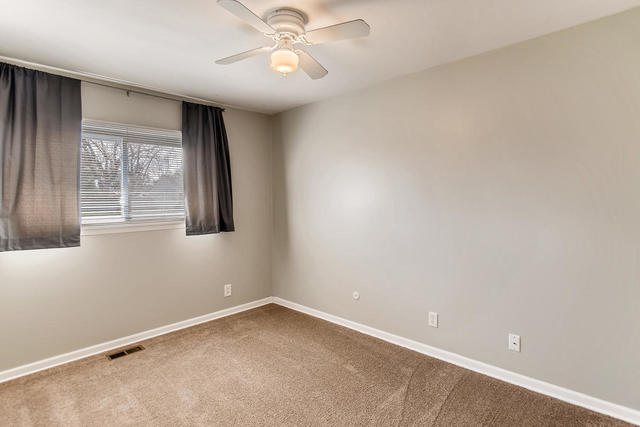67 Saugatuck Road Montgomery, IL 60538 - Photo 9 of 17 an empty room with a window