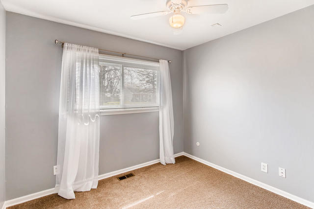 67 Saugatuck Road Montgomery, IL 60538 - Photo 10 of 17 an empty room with a window