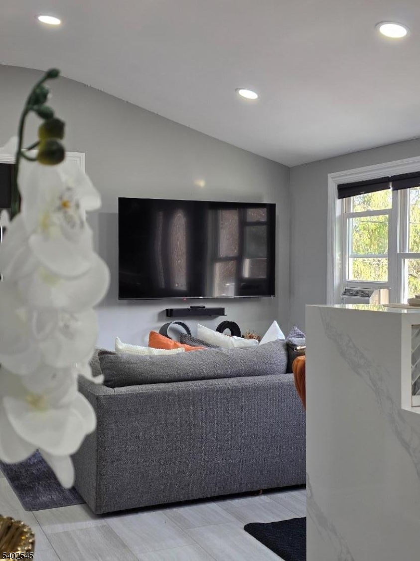 8 Warren Lane Wantage, NJ 07461 - Photo 5 of 11 a living room with furniture and a flat screen tv