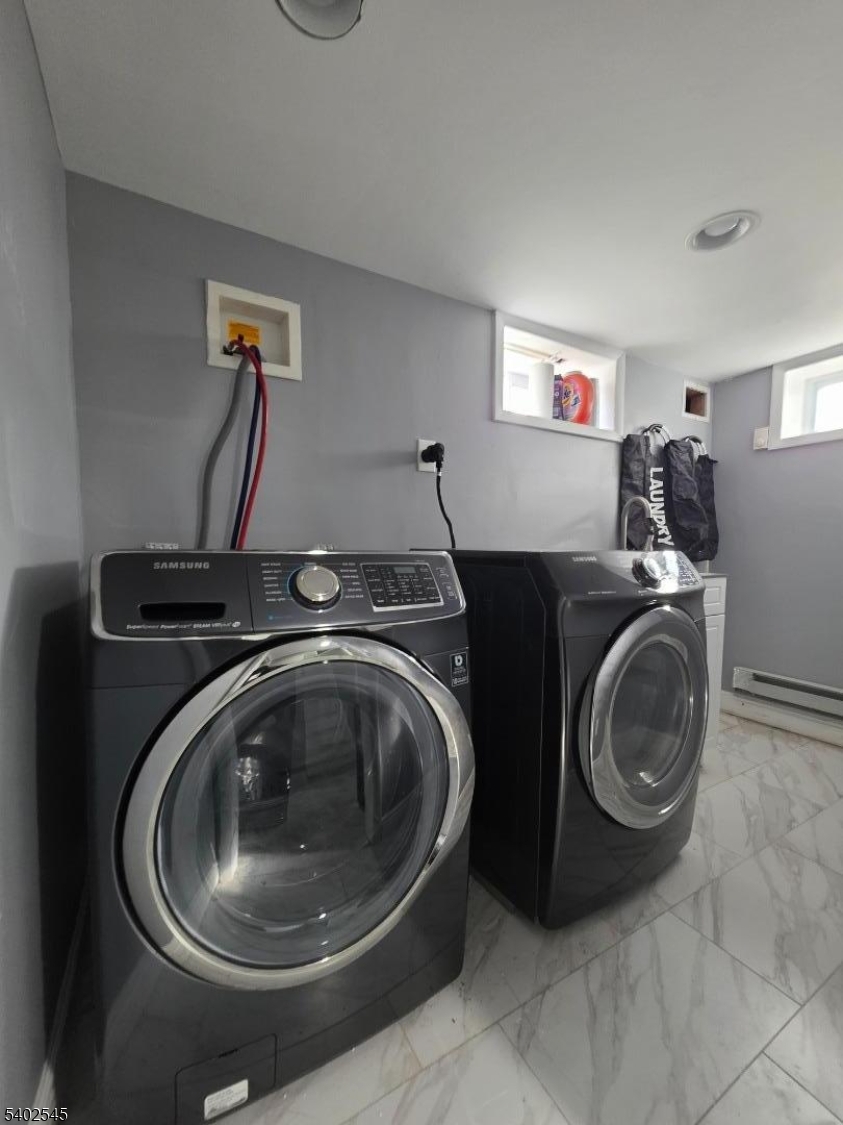 8 Warren Lane Wantage, NJ 07461 - Photo 6 of 11 a utility room with sink dryer and washer