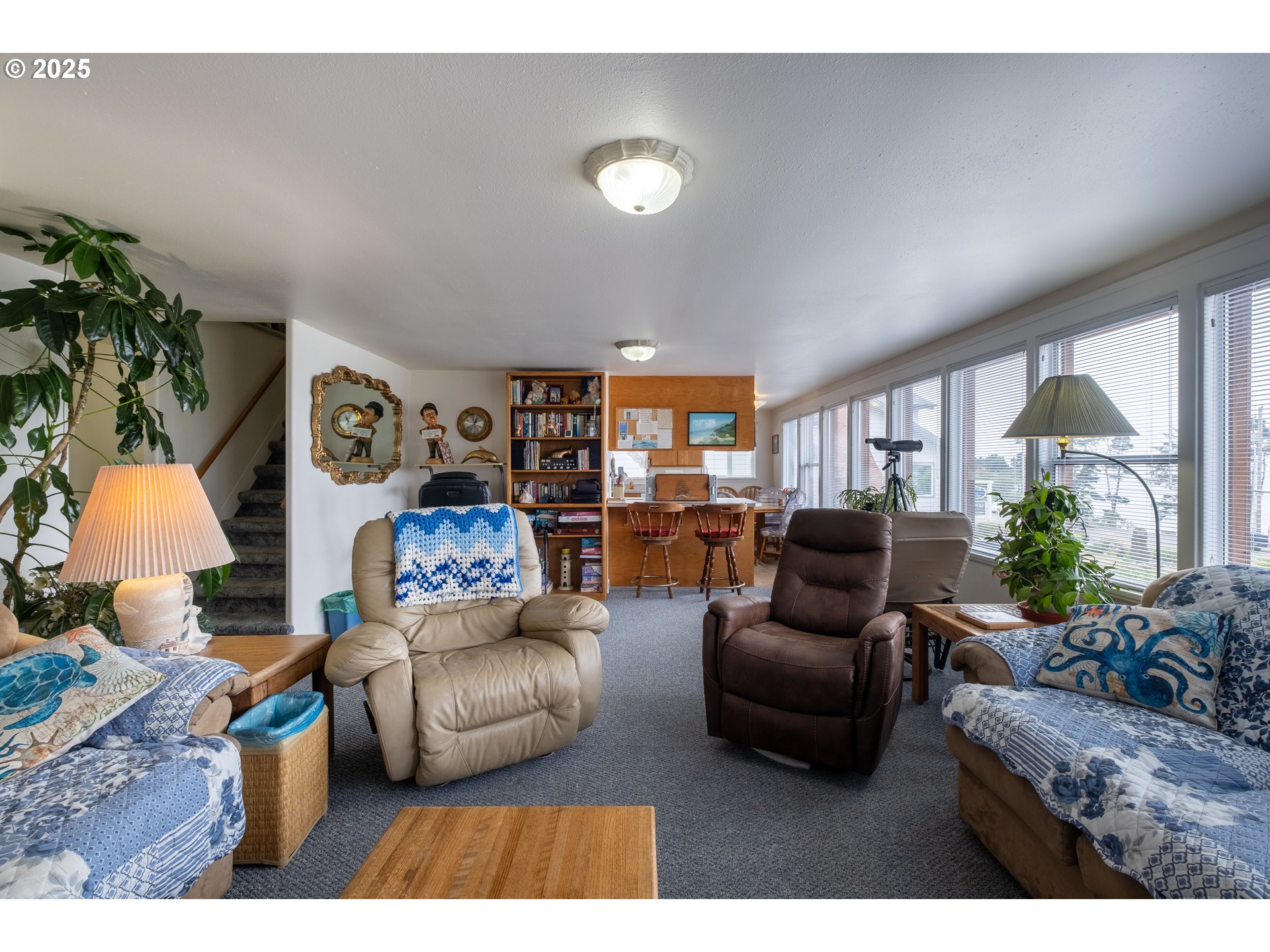 318 Highway 101 Depoe Bay, OR 97341 - Photo 19 of 47 a living room with furniture and a large window