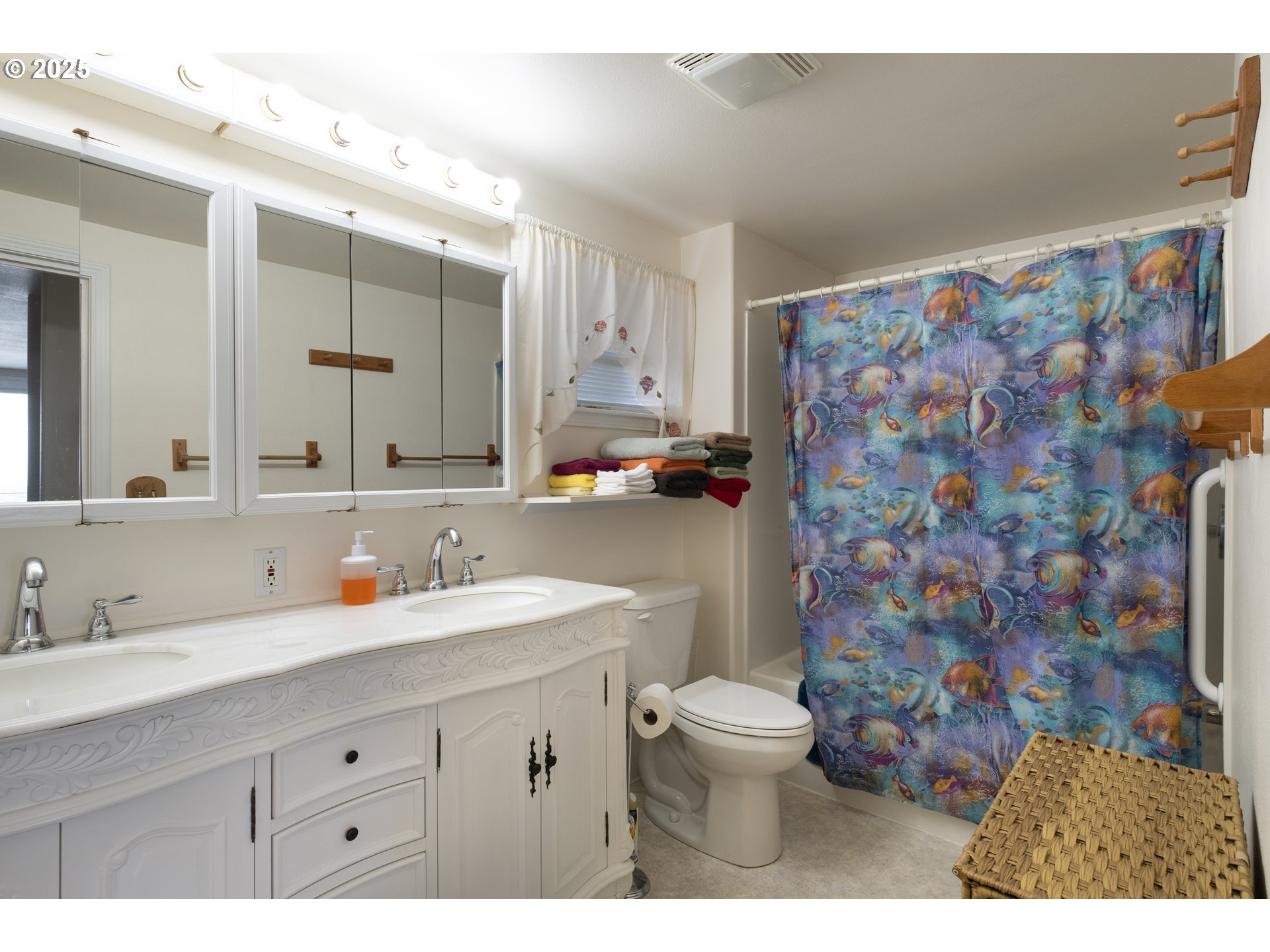 318 Highway 101 Depoe Bay, OR 97341 - Photo 23 of 47 a bathroom with a sink toilet and shower