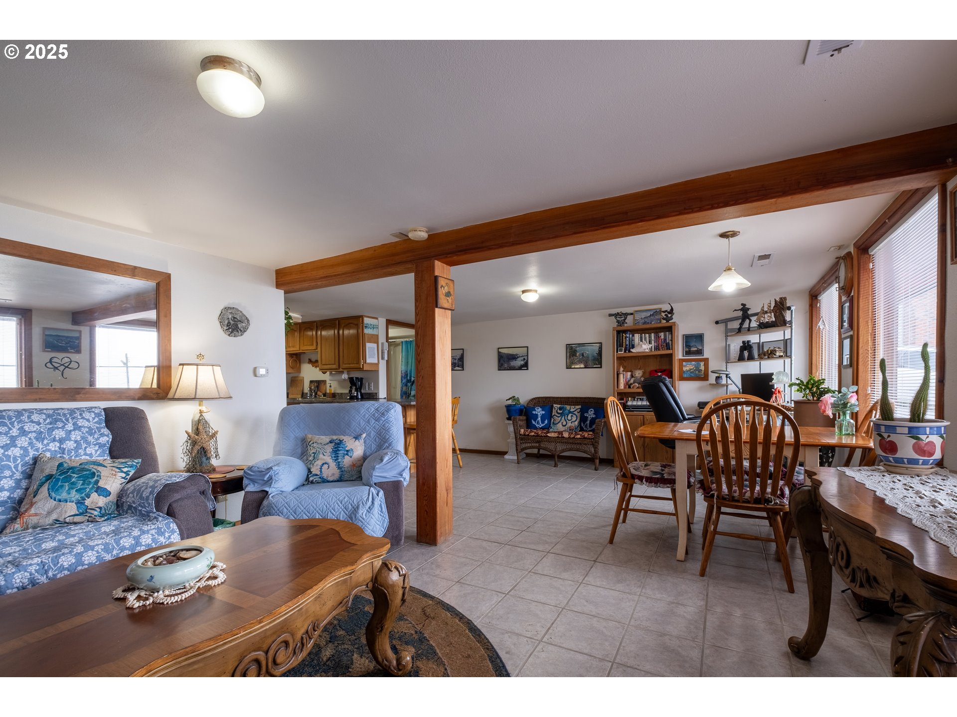 318 Highway 101 Depoe Bay, OR 97341 - Photo 29 of 47 a living room with furniture and a large window