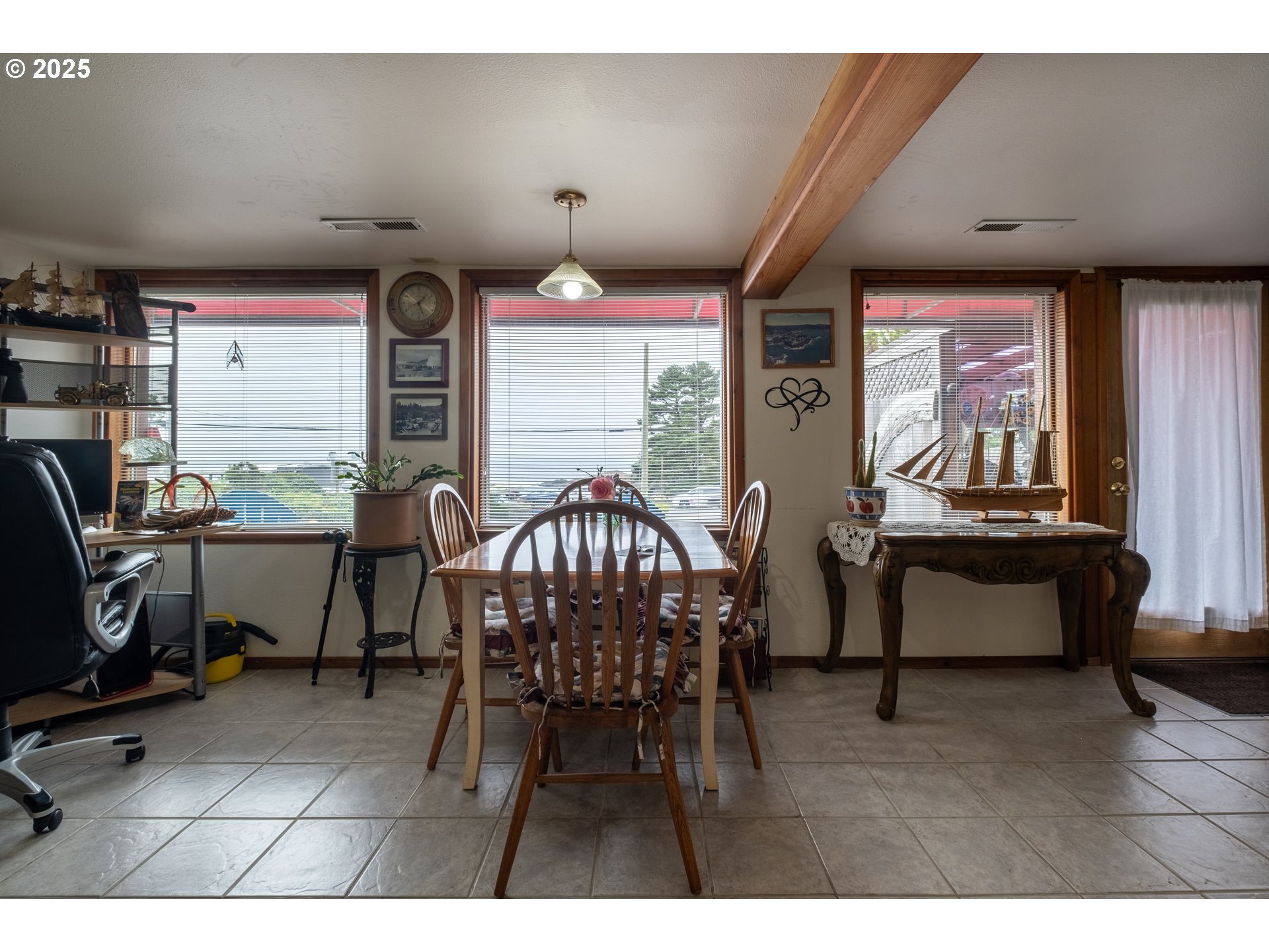 318 Highway 101 Depoe Bay, OR 97341 - Photo 30 of 47 a view of a livingroom with furniture and windows