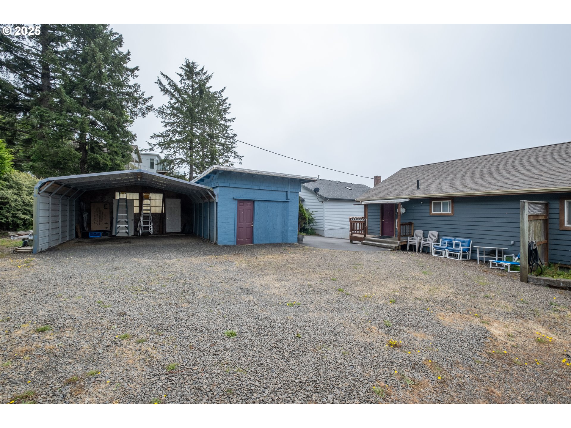 318 Highway 101 Depoe Bay, OR 97341 - Photo 45 of 47 a view of a house with a yard and sitting area