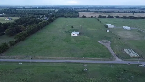 an aerial view of a city with lots of residential buildings