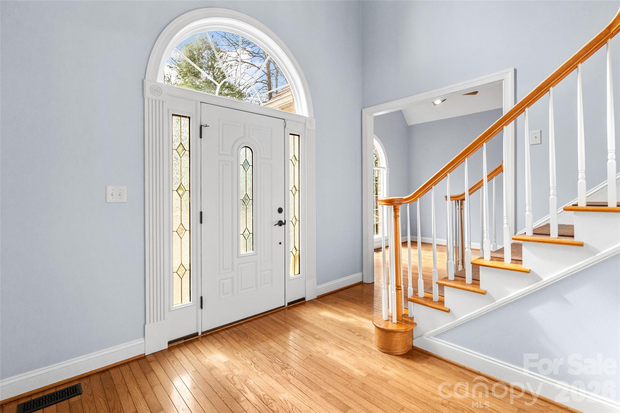 321 Forbes Court Clover, SC 29710 - Photo 4 of 31 a view of front door with hallway and wooden floor
