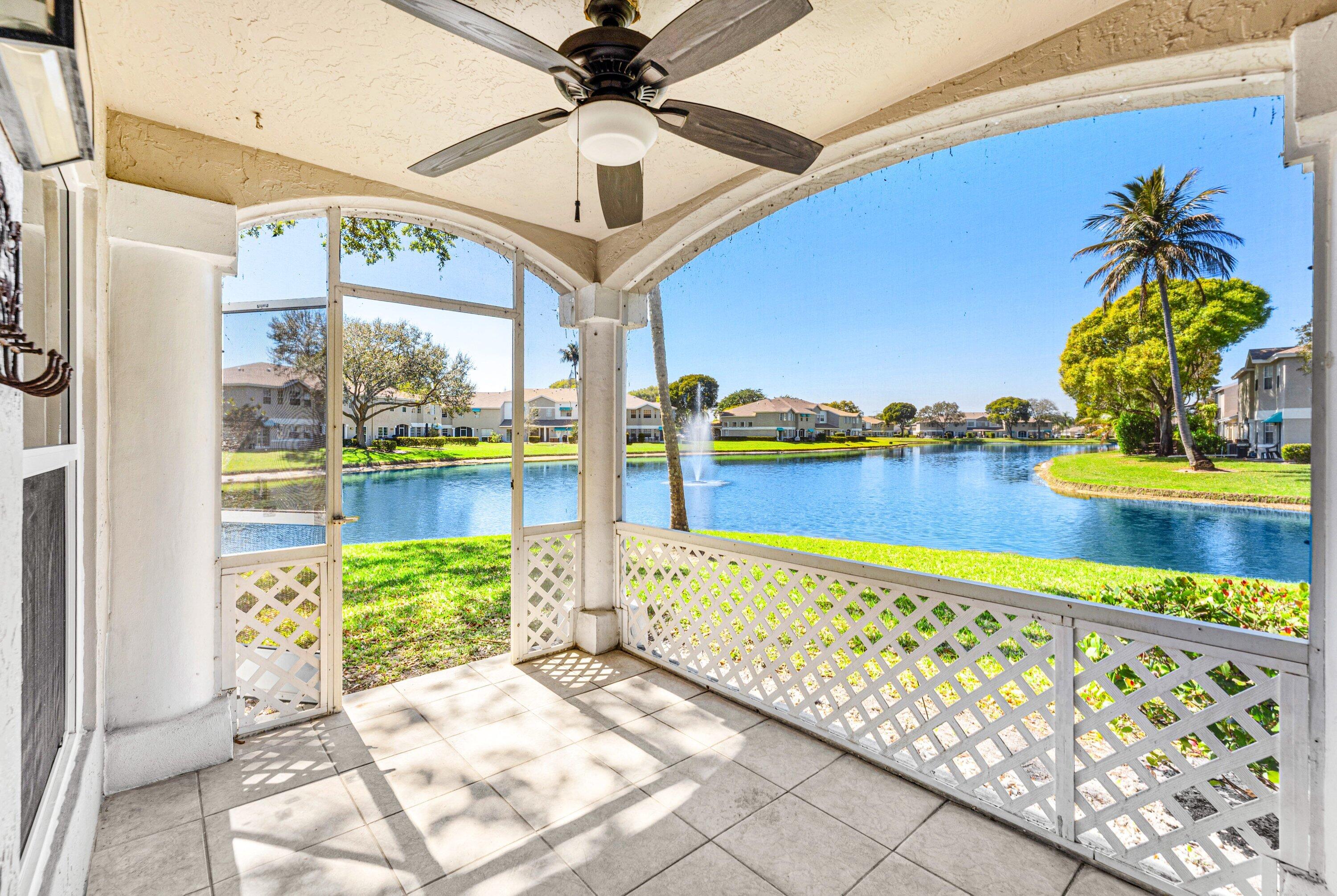 9118 Boca Gardens Parkway, Unit F Boca Raton, FL 33496 - Photo 19 of 56 a view of a balcony with furniture