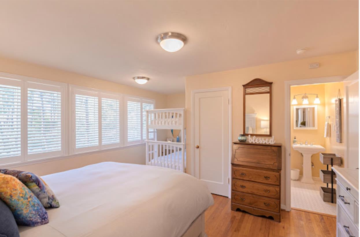 4174 Crest Road Pebble Beach, CA 93953 - Photo 12 of 14 a bedroom with a bed and a dresser
