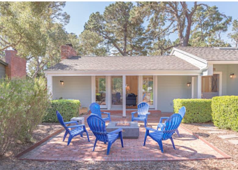 4174 Crest Road Pebble Beach, CA 93953 - Photo 2 of 14 a view of a house with backyard sitting area and garden