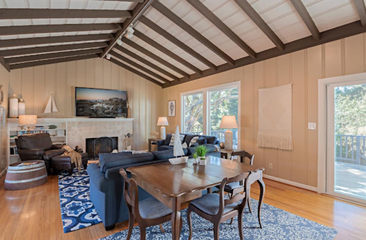 4174 Crest Road Pebble Beach, CA 93953 - Photo 4 of 14 a view of a dining room with furniture window and wooden floor