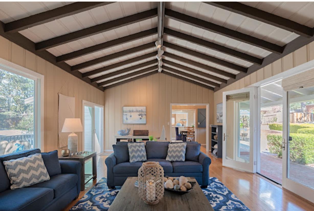 4174 Crest Road Pebble Beach, CA 93953 - Photo 5 of 14 a living room with furniture and a large window