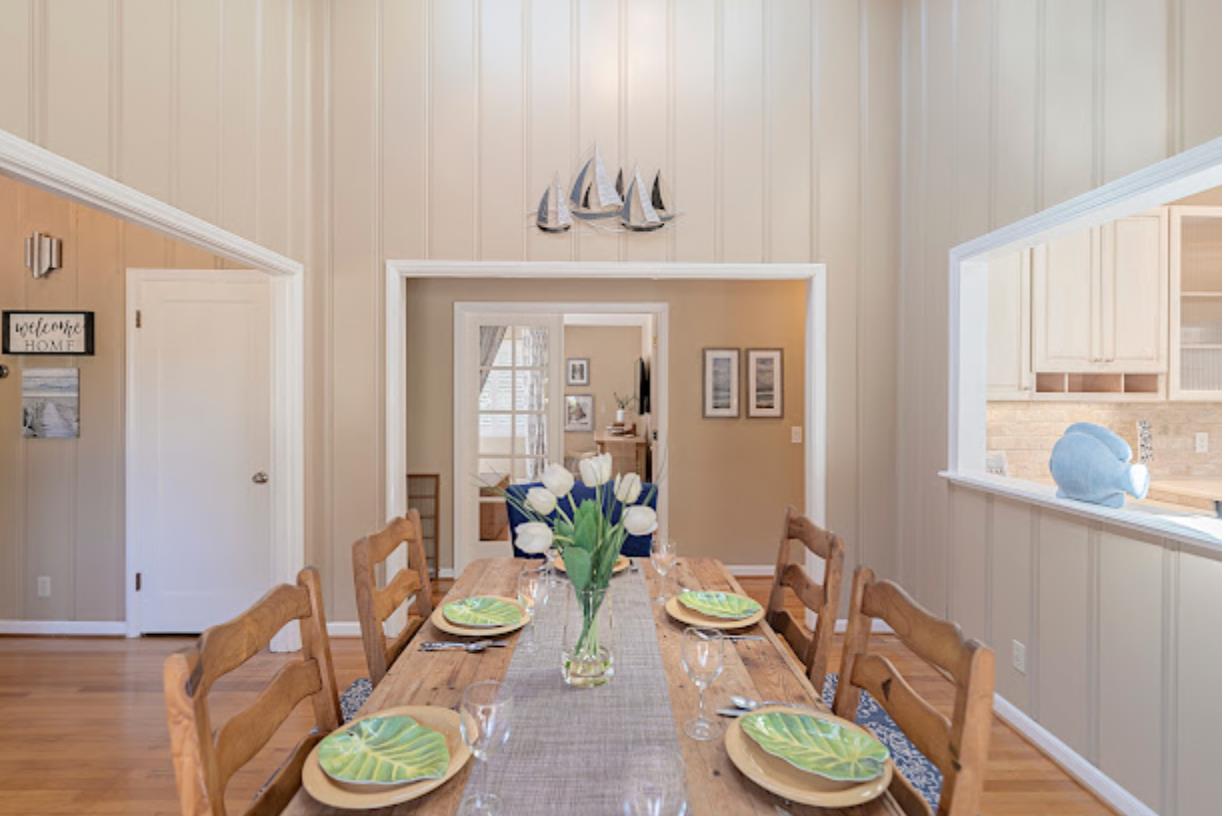4174 Crest Road Pebble Beach, CA 93953 - Photo 8 of 14 a view of a dining room with furniture kitchen and chandelier