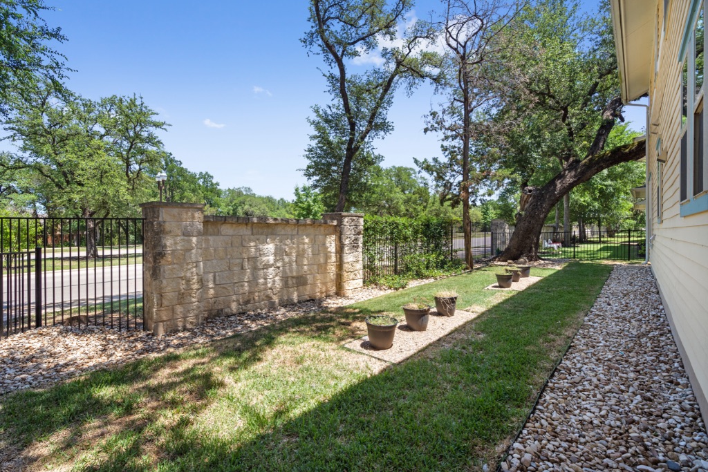 11229 Avery Station Loop, Unit 36 Austin, TX 78717 - Photo 32 of 37 View of fenced backyard