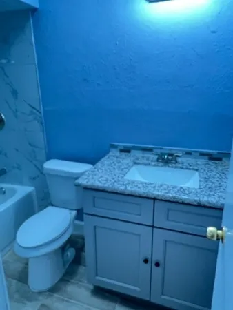 a bathroom with a toilet