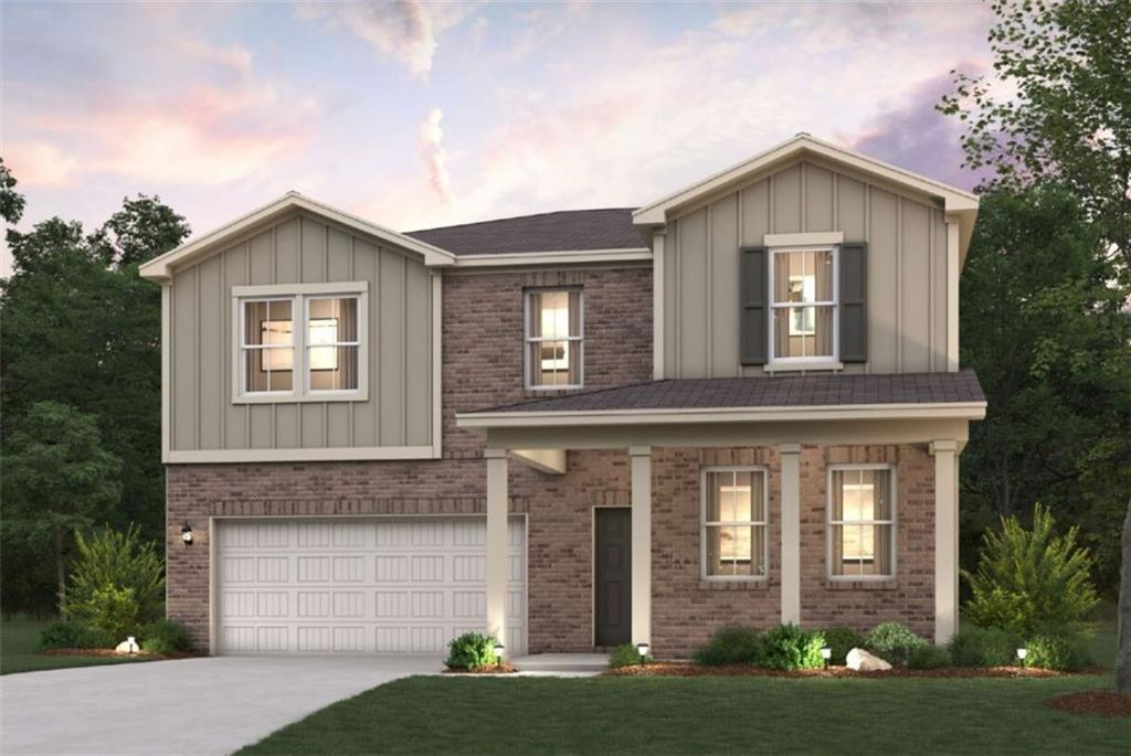 7141 Timberland Trail Lithonia, GA 30038 - Photo 1 of 1 a front view of a house with garden