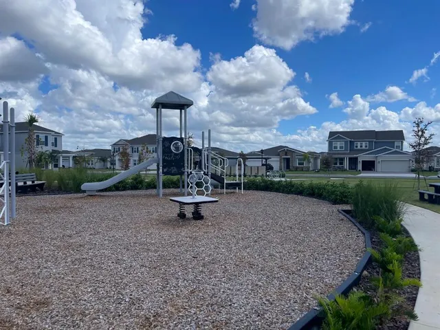 a view of a patio with swimming pool