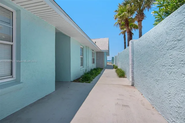 a view of a pathway with a house