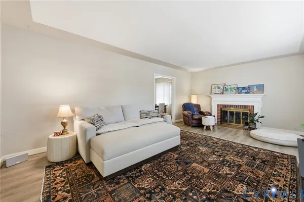 a bed room with furniture and a fireplace