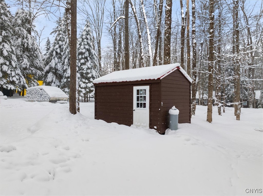 108 Long View East Webb, NY 13420 - Photo 3 of 23 Large heated shed easily fits 2 snowmobiles + work
