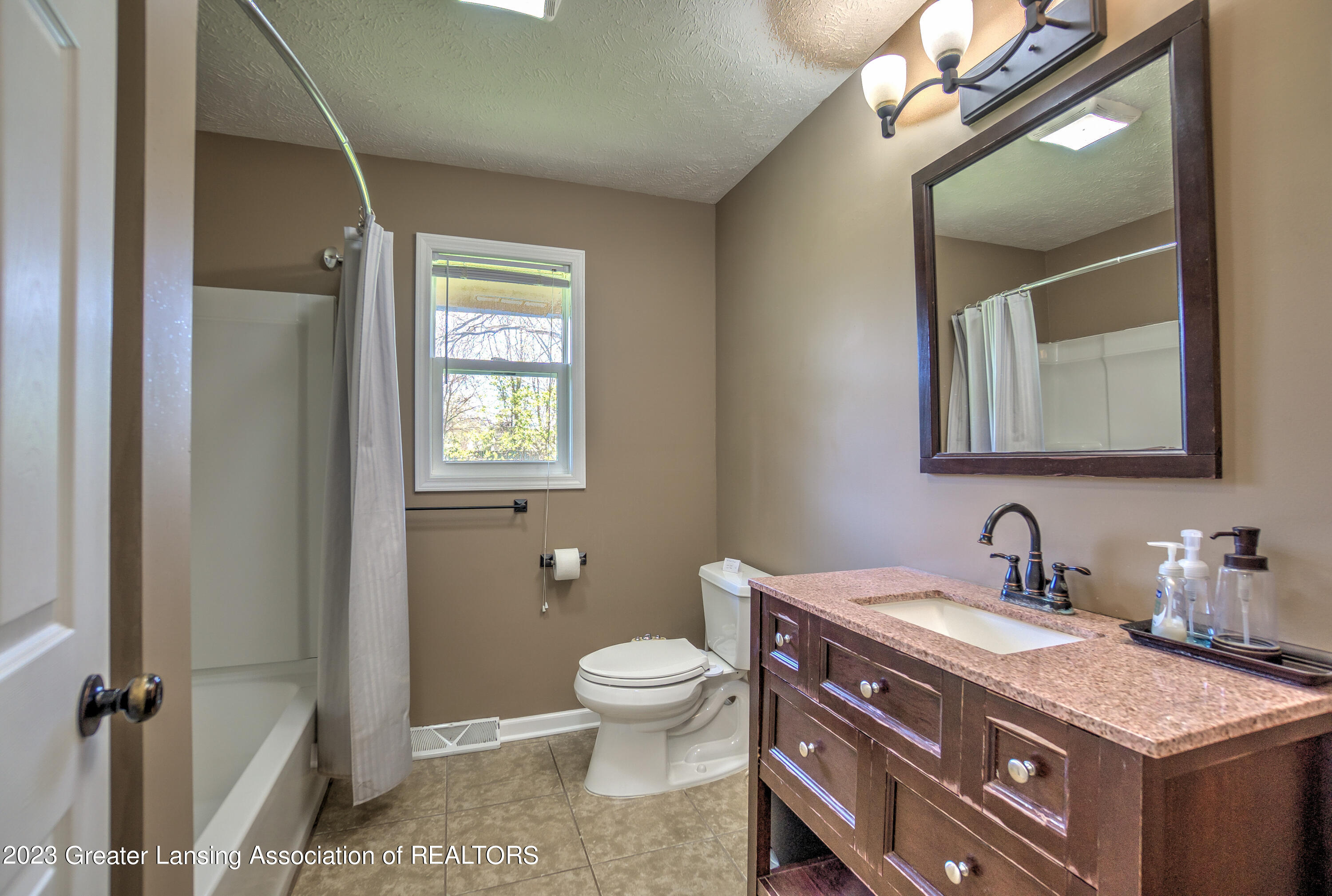6048 South Waverly Road Lansing, MI 48911 - Photo 23 of 33 Photo Apr 27 2023, 3 26 53 PM