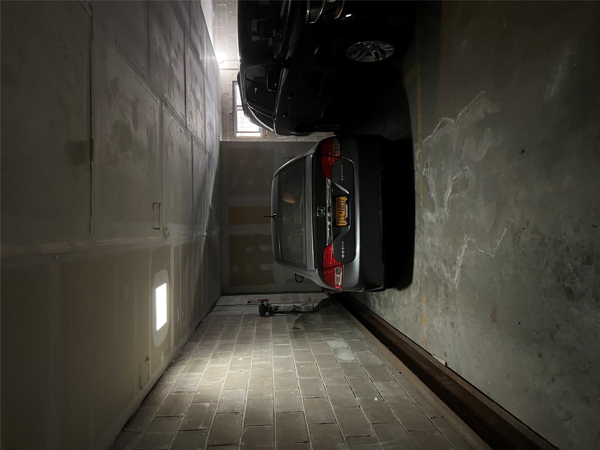 43-17 Union Street, Unit 6C Queens, NY 11355 - Photo 16 of 16 Parking deck with concrete block wall